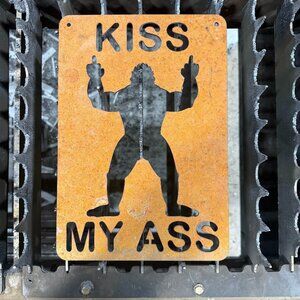 Bigfoot sign Kiss My A??